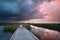 Bike road through lake at storm