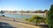 Bike in Seville at the Guadalquivir River and panoramic view of the Triana quarter, Spain