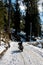 Bike on snow covered road in mountains