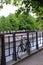 Bike standing at a railing on a promenade on the banks of the River Spree