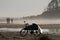 Bike with Surfboard Cover on Beach