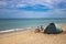 Bike and tourist camp on a sunny seashore