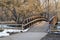 bike trail and footbridge over a river in winter or early spring