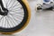 Bike wheel detail and skate. Sport background.