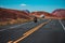 Biker driving on the Highway on legendary Route 66. Long Desert Highway California. Road trip in Arizona desert.