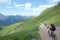 Biker on high mountain road, Italian Dolomites, Trentino Alto Adige, Italy