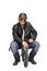 Biker in leather jacket sitting on a small bike