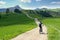 Biker riding scenic path in beautiful summer mountain scenery , Dolomites Italy, European Alps