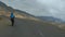 Biker Speeding On The Mountain Curssing Road To Leh In Ladakh, India - rolling shot