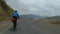 Biker Speeding On The Mountain Road To Leh In Ladakh, India - rolling shot