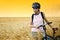 Biker in wheat field