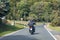 Biker on a winding country road