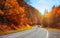 Bikers on mountainous highway, biker on the road in sunset light