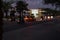 Bikers ride at night on the highway on Al-Marjan Island. United Arab Emirates