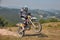 Bikers riding enduro motorcycles Husqvarna 450