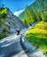 Bikers tour along Alps