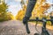 Biking first person view of bike cyclist POV showing hands and handlebar on road bicycle riding on outdoor commute in