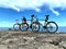 Biking mountain biking on bike on rock stone ,Biking mountain on horizon blue sky  white clouds nature panorama seascape landscape