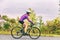 Biking road bike athlete cyclist woman riding bicycle training cardio outdoor. Active fit lifestyle fitness exercise