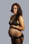 Bikini-clad Woman Eight Months Pregnant