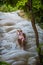 Bikini Girl enjoys refreshing water of sticky waterfall Bua Tong Waterfalls Chiang Mai