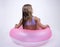 Bikini girl on a float on her back