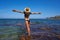 Bikini girl in summer Mediterranean beach having fun