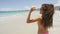 Bikini vacation woman relaxing walking on Isla Verde beach San Juan Puerto Rico