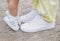Bila Tserkva, Ukraine, August 2020: Mom and daughter are in the same white sneakers Adidas