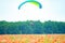 Bila Tserkva, Ukraine. June 20, 2016 Paragliding, training flights with paramotor over blooming filed and forest