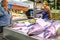 Bilbao, Bizkaia, Spain - October 5, 2017. Men, seller and buyer in the ancient food market Ribera with local products. Big tuna on