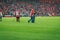 BILBAO, SPAIN - ARPIL 7: Maintenance staff manages the football field of rain before the match between Athletic Bilbao and