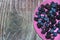 Bilberries on a pink plate