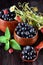 Bilberries in wooden bowls