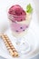 Bilberry sorbet and vanilla ice cream in a glass
