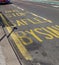 Bilingual bus stop lane marking