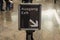 Bilingual exit sign at international airport or bank