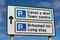 Bilingual street sign indicating parking Llandudno North Wales
