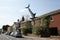 Bill Heine`s Shark in a roof statue in Headington, Oxford in the UK