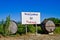 Billboard with barrels says Welcome in France