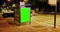 Billboard with a chroma key green screen on a traffic cars city night street, light night, advertisement