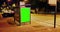 Billboard with a chroma key green screen on a traffic cars city night street, light night, advertisement