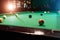 Billiard balls on the billiard table, American billiards. Sports games, outdoor activities