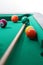 Billiard balls and cue