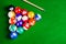 Billiard balls on green table with billiard cue, Snooker,