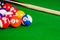 Billiard balls on green table with billiard cue, Snooker, Pool.