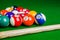 Billiard balls on green table with billiard cue, Snooker, Pool.