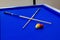 Billiard balls with sticks on the table