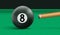 Billiard eight ball and cue on green cloth table