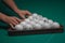 Billiard green table in hall with white balls